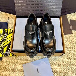Prada Black Leather Loafers with Logo Detail